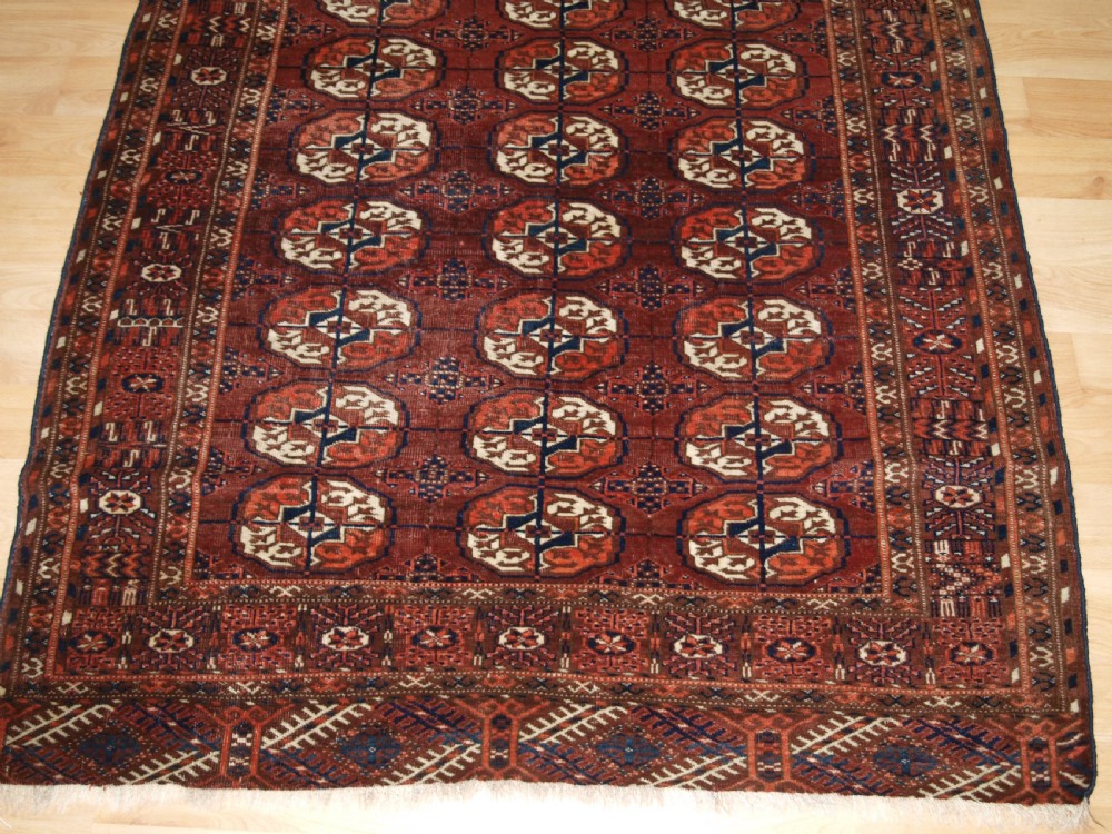 ANTIQUE TEKKE TURKMEN RUG, SMALL SIZE, RED / BROWN COLOUR, CIRCA 1900. View VII