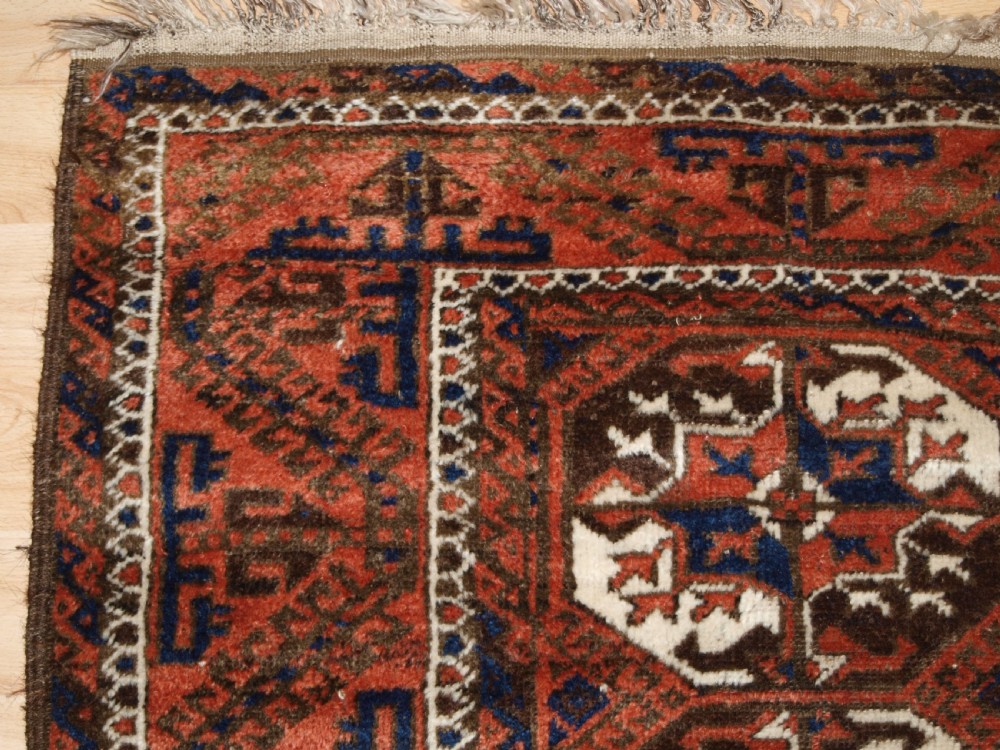 ANTIQUE MAHDAD KHANI BALUCH RUG, LARGE TURKMEN GULS, CIRCA 1900. View III