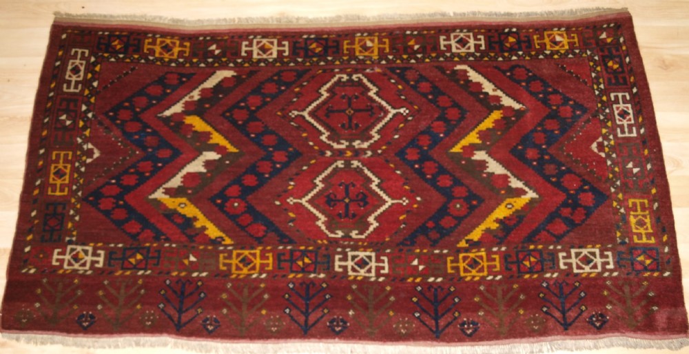 ANTIQUE ERSARI BESHIR TURKMEN IKAT DESIGN CHUVAL, CIRCA 1900.