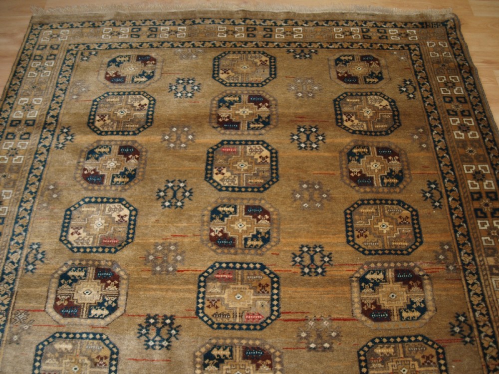 OLD FADED AFGHAN RUG WITH ERSARI TURKMEN DESIGN, CIRCA 1920/30. View III