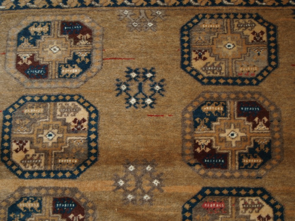OLD FADED AFGHAN RUG WITH ERSARI TURKMEN DESIGN, CIRCA 1920/30. View V