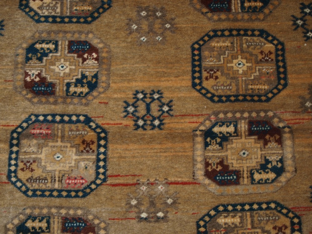 OLD FADED AFGHAN RUG WITH ERSARI TURKMEN DESIGN, CIRCA 1920/30. View VI