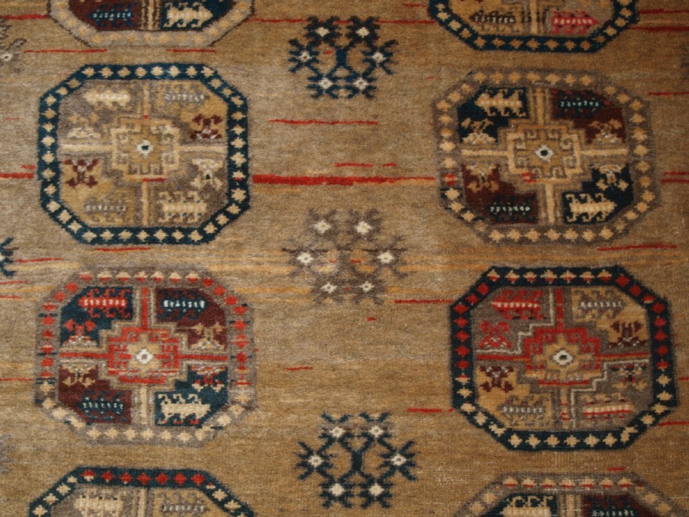 OLD FADED AFGHAN RUG WITH ERSARI TURKMEN DESIGN, CIRCA 1920/30. View VII