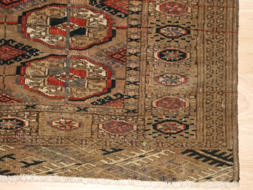 ANTIQUE TEKKE TURKMEN RUG WITH FADED COLOURS, CIRCA 1900. View VII