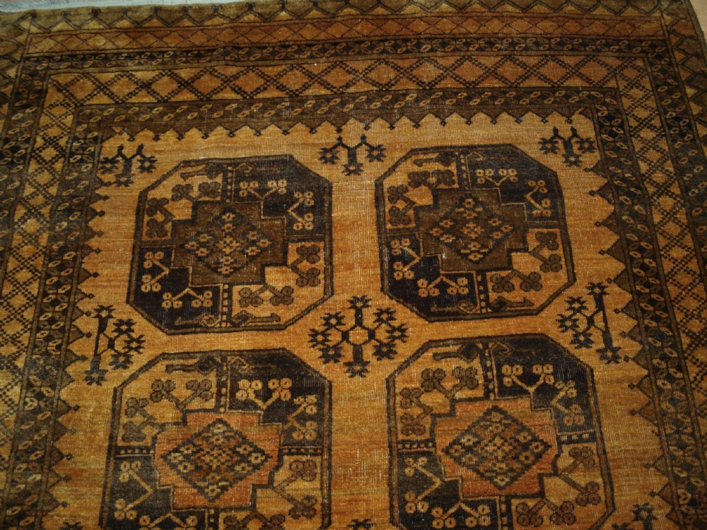 OLD AFGHAN ERSARI RUG, FADED GOLD COLOUR, CIRCA 1920/30. View III