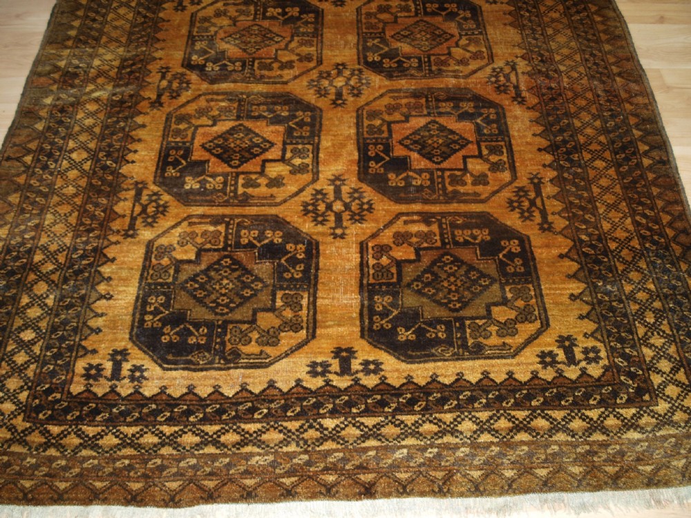 OLD AFGHAN ERSARI RUG, FADED GOLD COLOUR, CIRCA 1920/30. View V