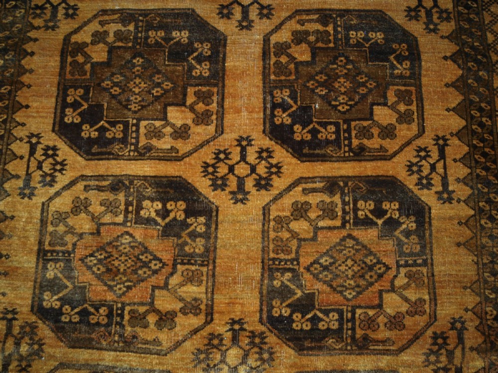 OLD AFGHAN ERSARI RUG, FADED GOLD COLOUR, CIRCA 1920/30. View VI