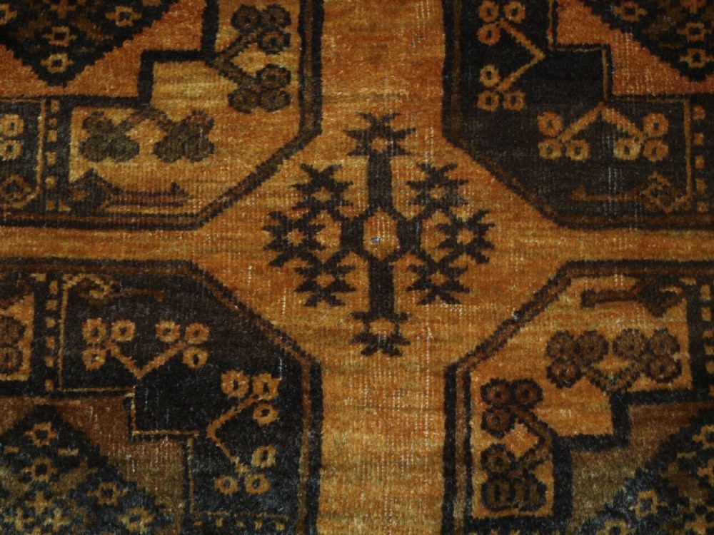 OLD AFGHAN ERSARI RUG, FADED GOLD COLOUR, CIRCA 1920/30. View VIII