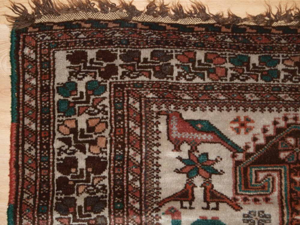 OLD KURDISH VILLAGE RUG, HOOKED MEDALLIONS WITH ANIMALS, CIRCA 1920. View III