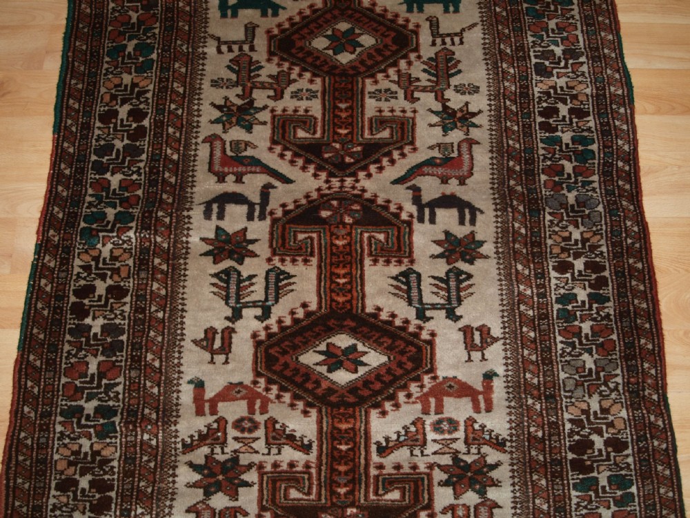 OLD KURDISH VILLAGE RUG, HOOKED MEDALLIONS WITH ANIMALS, CIRCA 1920. View V
