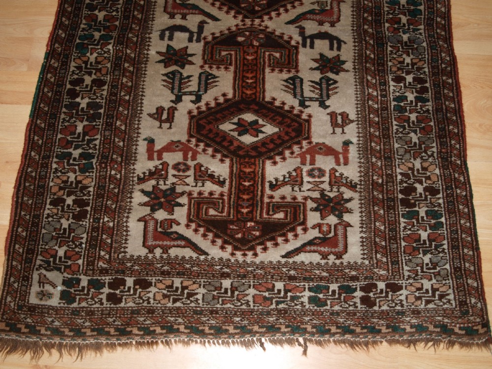 OLD KURDISH VILLAGE RUG, HOOKED MEDALLIONS WITH ANIMALS, CIRCA 1920. View VI