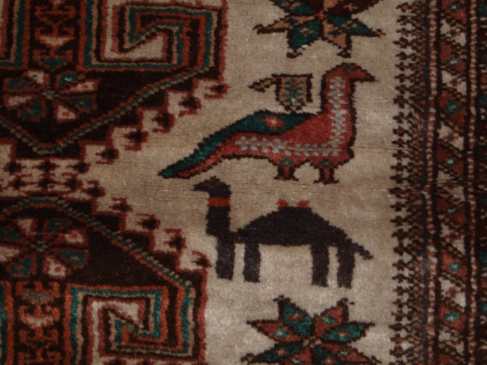 OLD KURDISH VILLAGE RUG, HOOKED MEDALLIONS WITH ANIMALS, CIRCA 1920. View VIII
