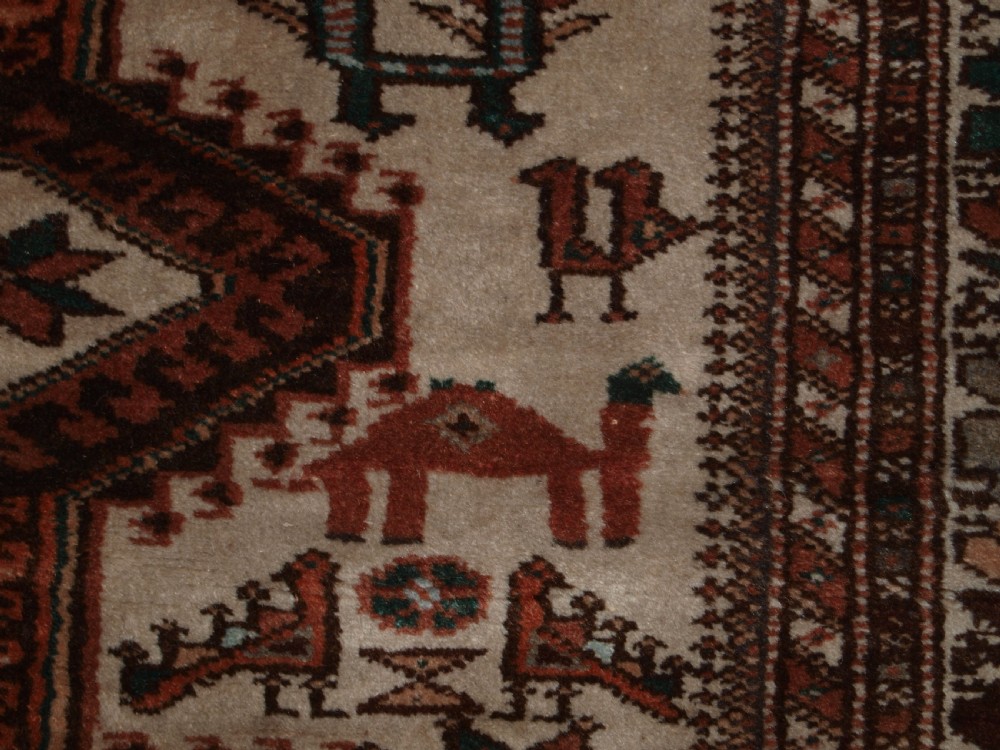 OLD KURDISH VILLAGE RUG, HOOKED MEDALLIONS WITH ANIMALS, CIRCA 1920. View IX