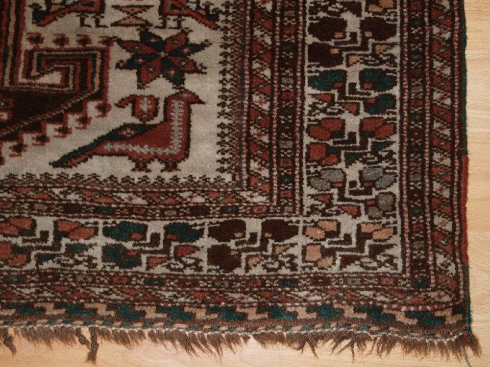 OLD KURDISH VILLAGE RUG, HOOKED MEDALLIONS WITH ANIMALS, CIRCA 1920. View X
