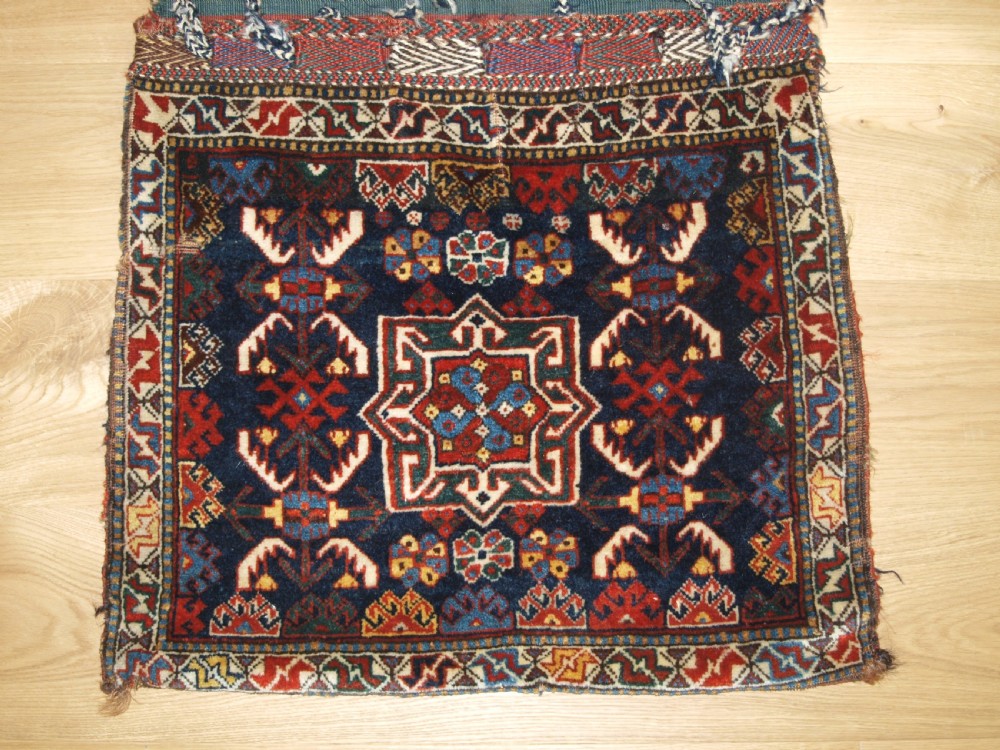 ANTIQUE COMPLETE KHORJIN SADDLEBAGS BY THE KHAMSEH TRIBE, CIRCA 1880. View II