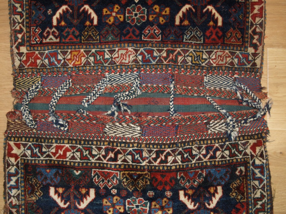 ANTIQUE COMPLETE KHORJIN SADDLEBAGS BY THE KHAMSEH TRIBE, CIRCA 1880. View III