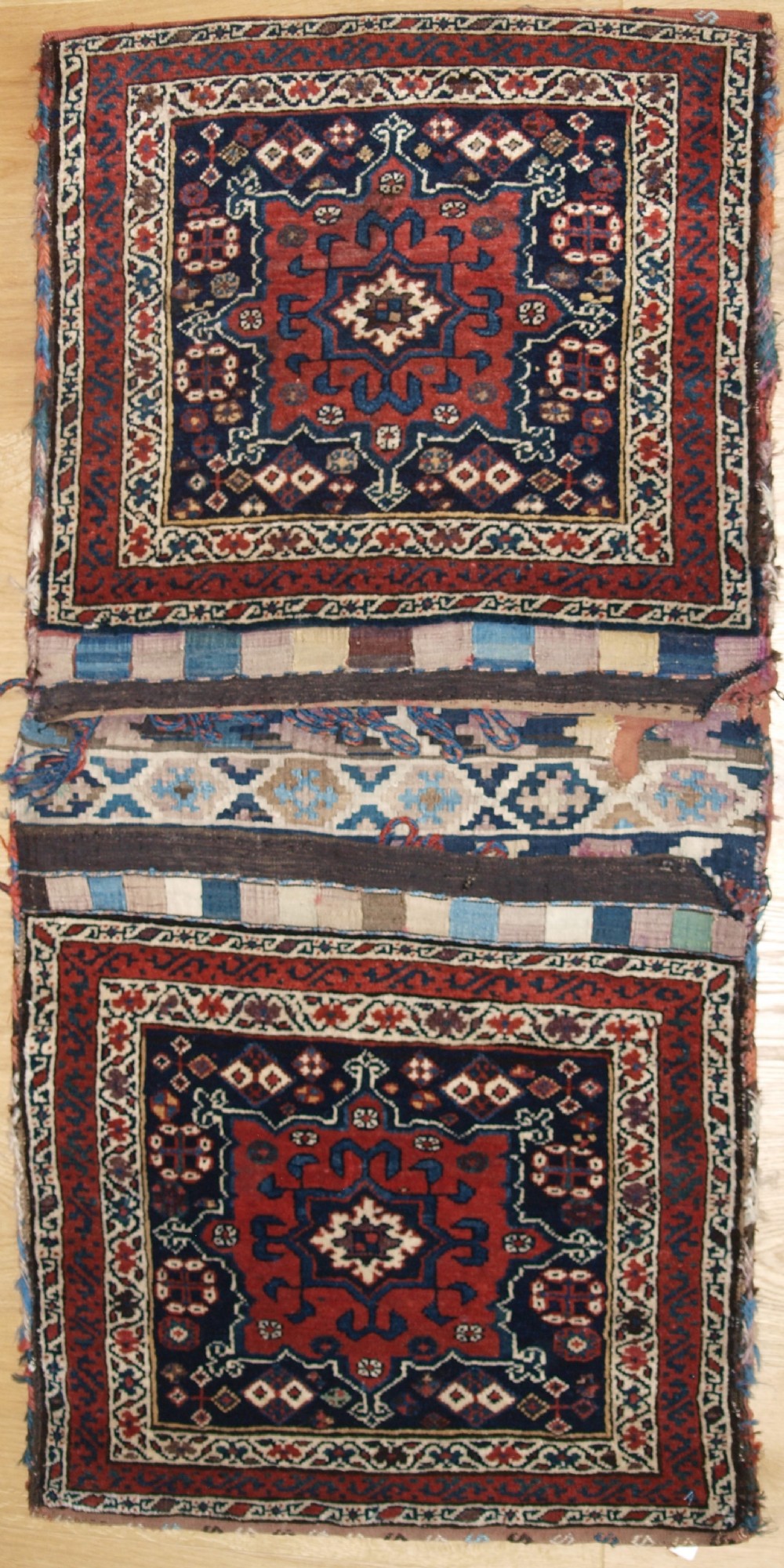 ANTIQUE SOUTH CAUCASIAN OR SHAHSAVAN KHORJIN SADDLEBAGS, CIRCA 1890.