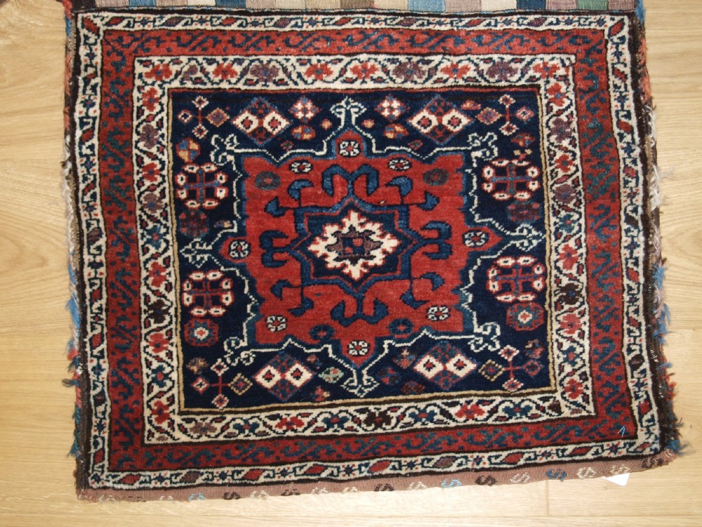 ANTIQUE SOUTH CAUCASIAN OR SHAHSAVAN KHORJIN SADDLEBAGS, CIRCA 1890. View II