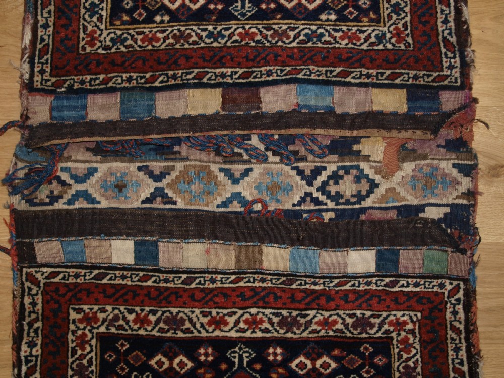 ANTIQUE SOUTH CAUCASIAN OR SHAHSAVAN KHORJIN SADDLEBAGS, CIRCA 1890. View III