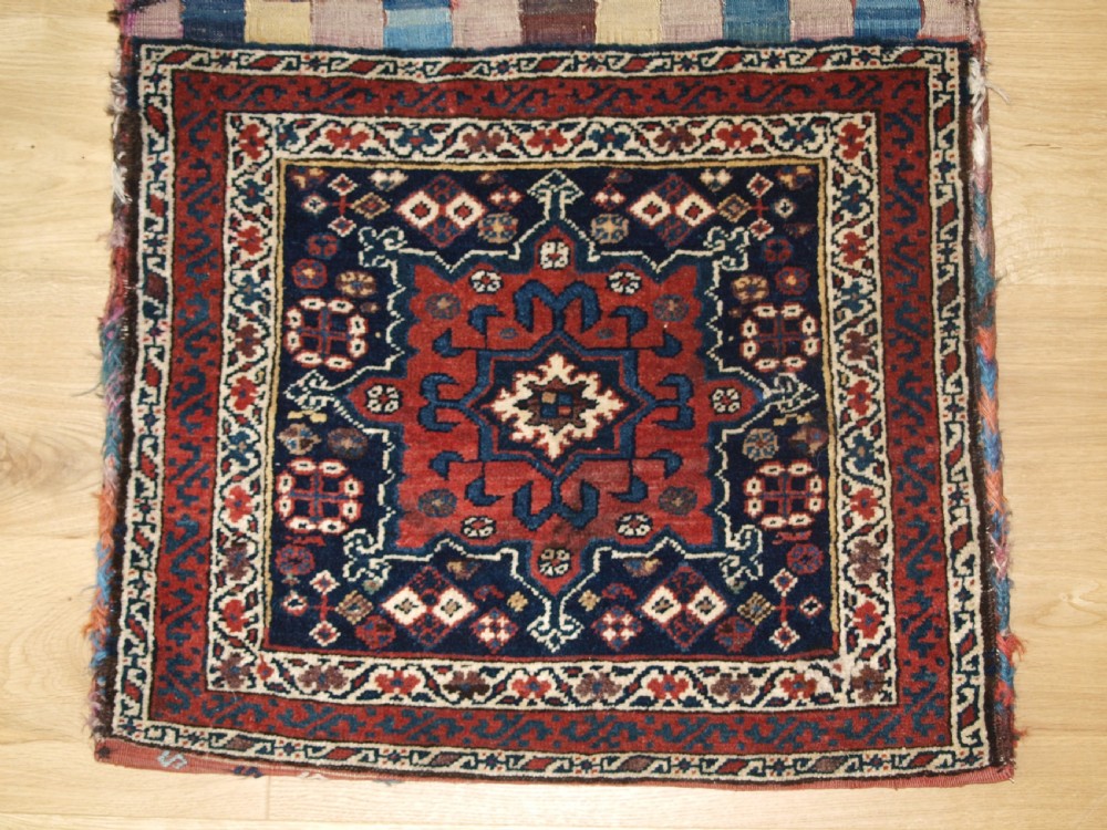 ANTIQUE SOUTH CAUCASIAN OR SHAHSAVAN KHORJIN SADDLEBAGS, CIRCA 1890. View IV