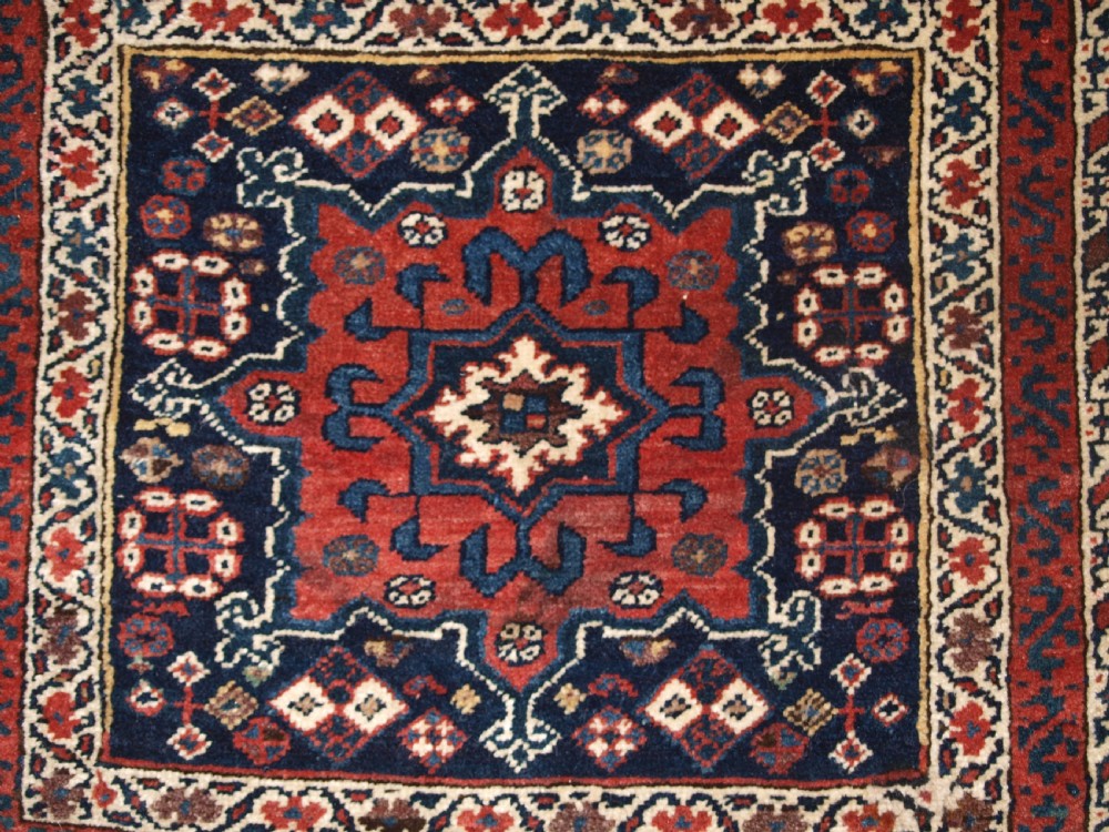 ANTIQUE SOUTH CAUCASIAN OR SHAHSAVAN KHORJIN SADDLEBAGS, CIRCA 1890. View V