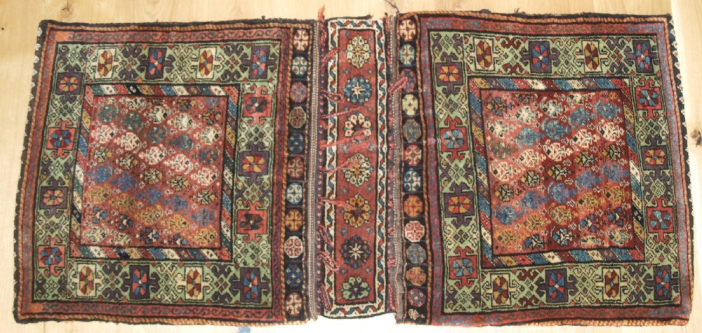 ANTIQUE KURDISH VARAMIN REGION KHORJIN SADDLEBAGS, GREAT COLOUR, CIRCA 1900.