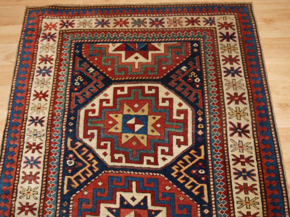 ANTIQUE CAUCASIAN MOGHAN KAZAK RUNNER WITH MEMLING GUL DESIGN, CIRCA 1880. View IV
