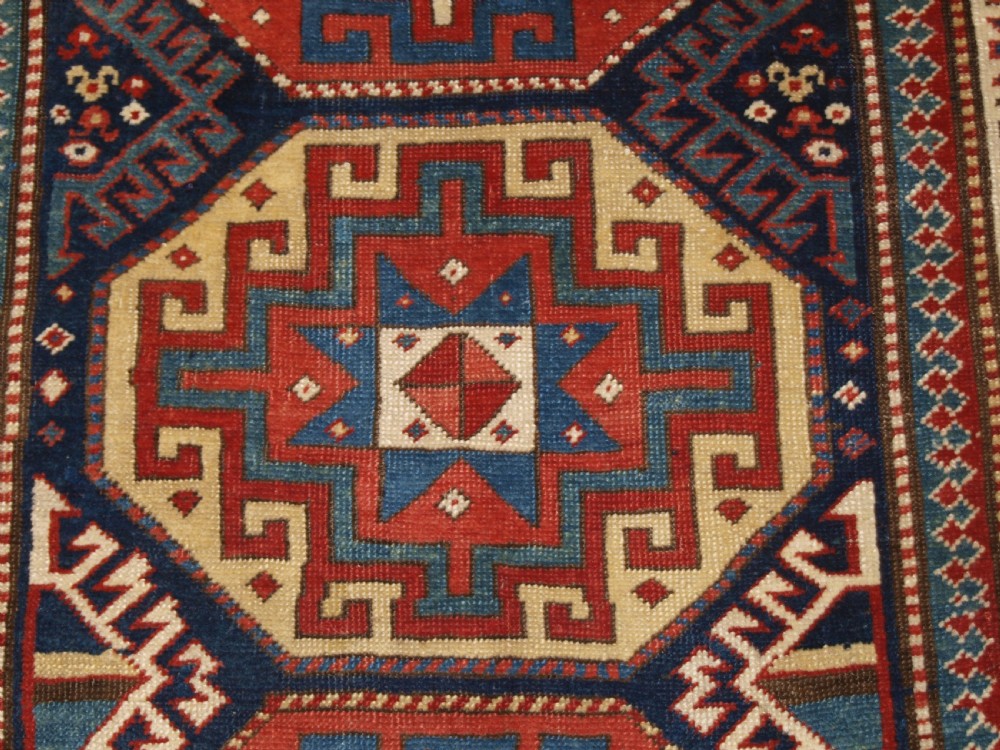 ANTIQUE CAUCASIAN MOGHAN KAZAK RUNNER WITH MEMLING GUL DESIGN, CIRCA 1880. View VII