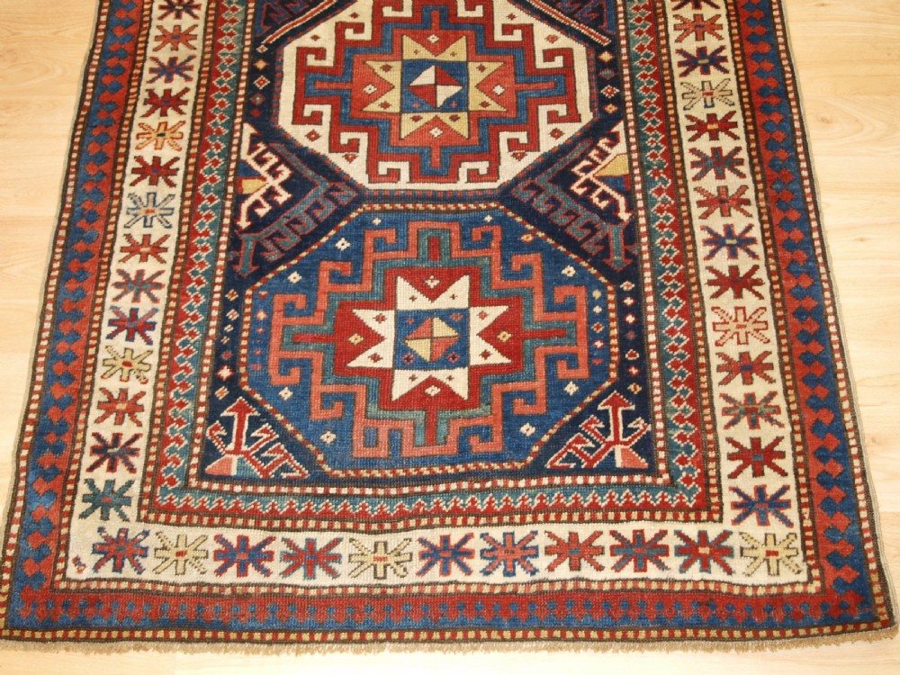 ANTIQUE CAUCASIAN MOGHAN KAZAK RUNNER WITH MEMLING GUL DESIGN, CIRCA 1880. View VIII