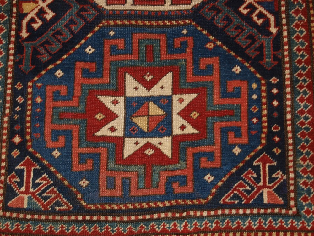 ANTIQUE CAUCASIAN MOGHAN KAZAK RUNNER WITH MEMLING GUL DESIGN, CIRCA 1880. View IX