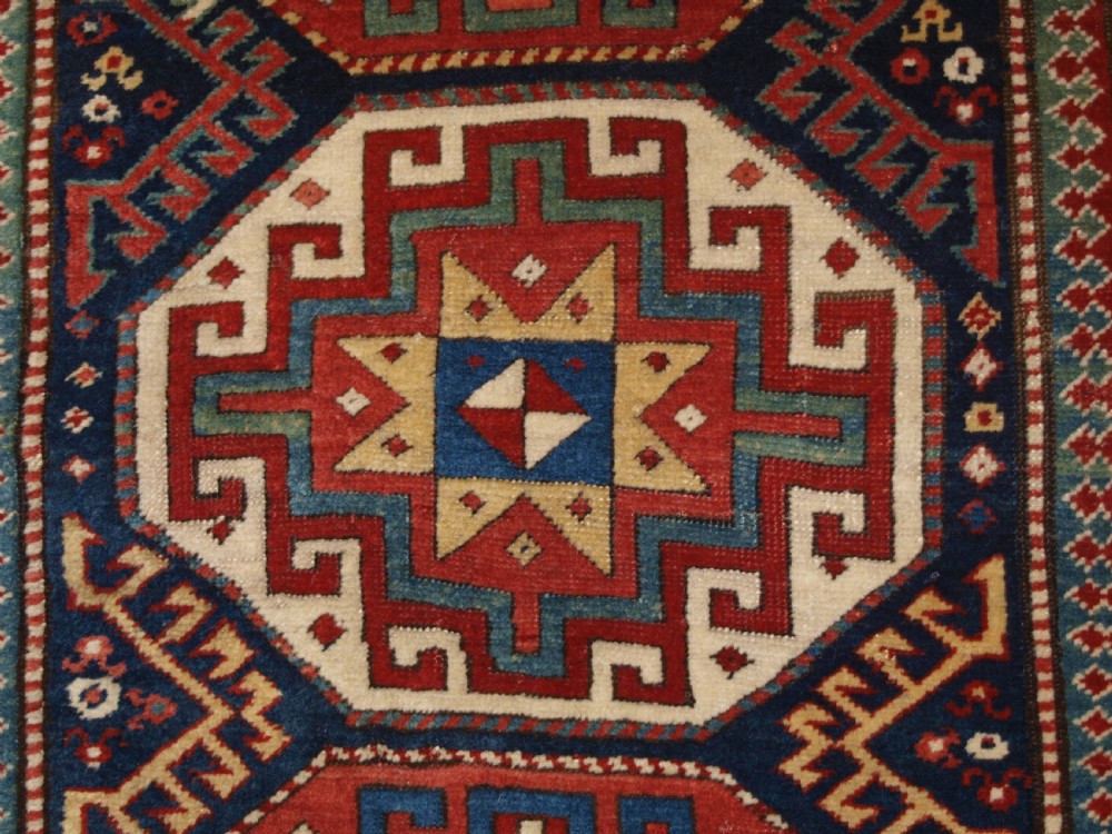 ANTIQUE CAUCASIAN MOGHAN KAZAK RUNNER WITH MEMLING GUL DESIGN, CIRCA 1880. View X