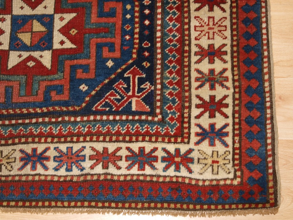 ANTIQUE CAUCASIAN MOGHAN KAZAK RUNNER WITH MEMLING GUL DESIGN, CIRCA 1880. View XI
