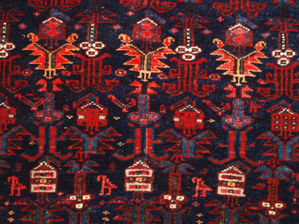 An antique hand-knotted Kurdish Kelleh long rug featuring a deep navy central field with geometric motifs enclosed by an ivory dragon pattern border. View VII