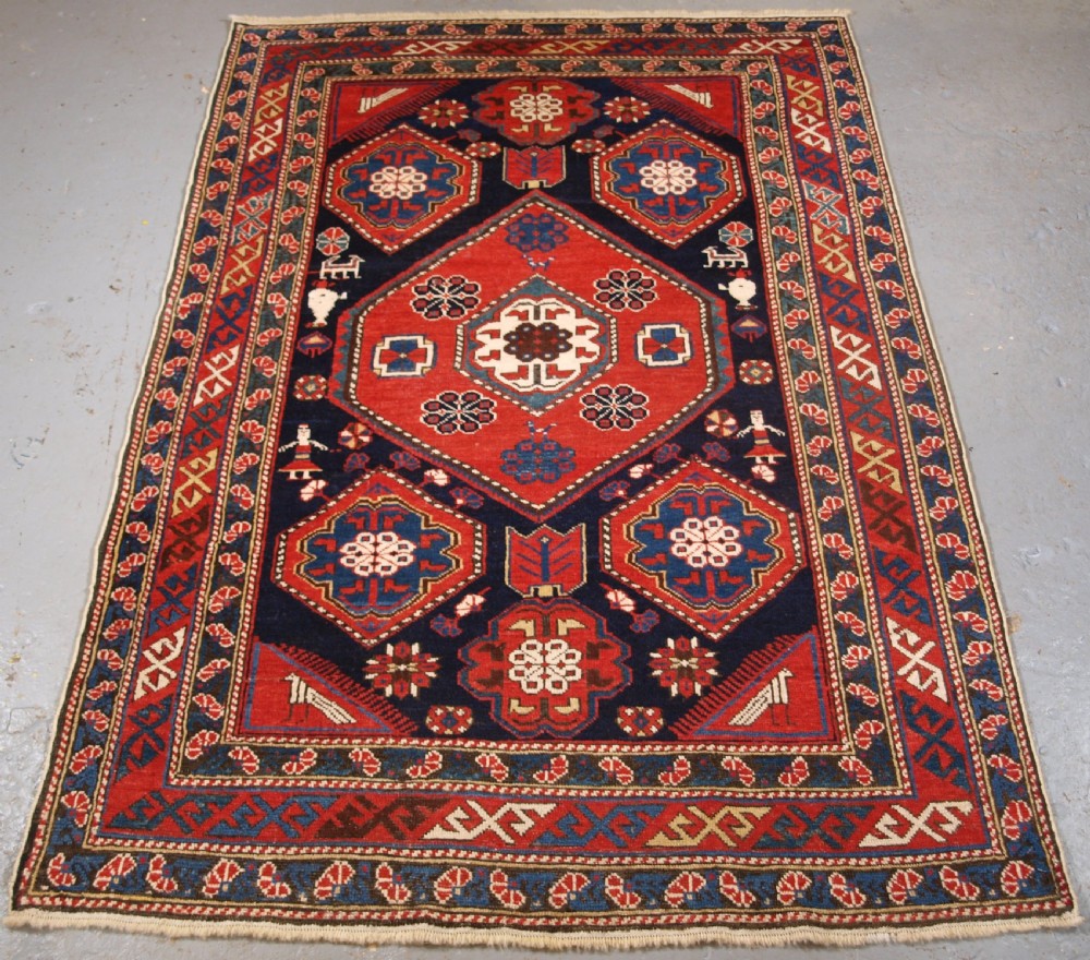 ANTIQUE CAUCASIAN KHILA SHIRVAN RUG, OUTSTANDING COLOUR, CIRCA 1890.