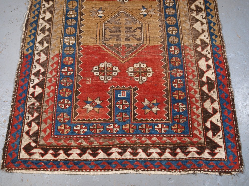 ANTIQUE CAUCASIAN BORDJALOU KAZAK PRAYER RUG, CIRCA 1880. View V