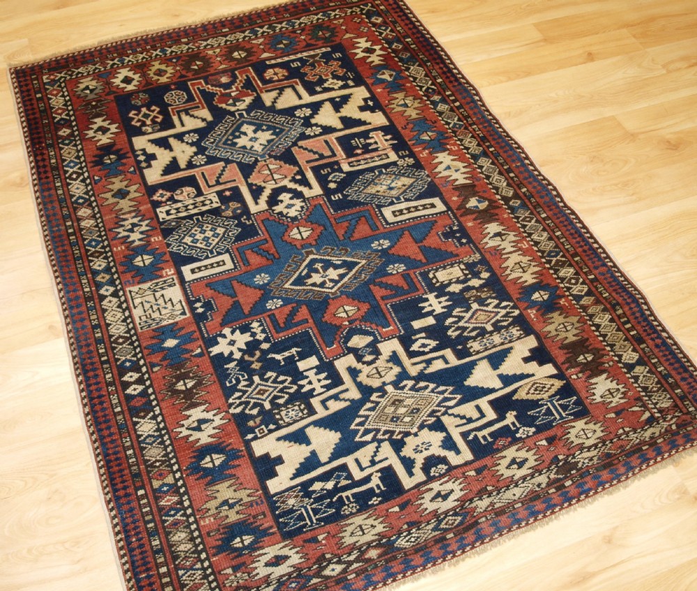 ANTIQUE CAUCASIAN SHIRVAN RUG WITH LESGHI STAR DESIGN, CIRCA 1890. View II