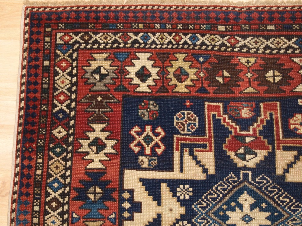 ANTIQUE CAUCASIAN SHIRVAN RUG WITH LESGHI STAR DESIGN, CIRCA 1890. View III