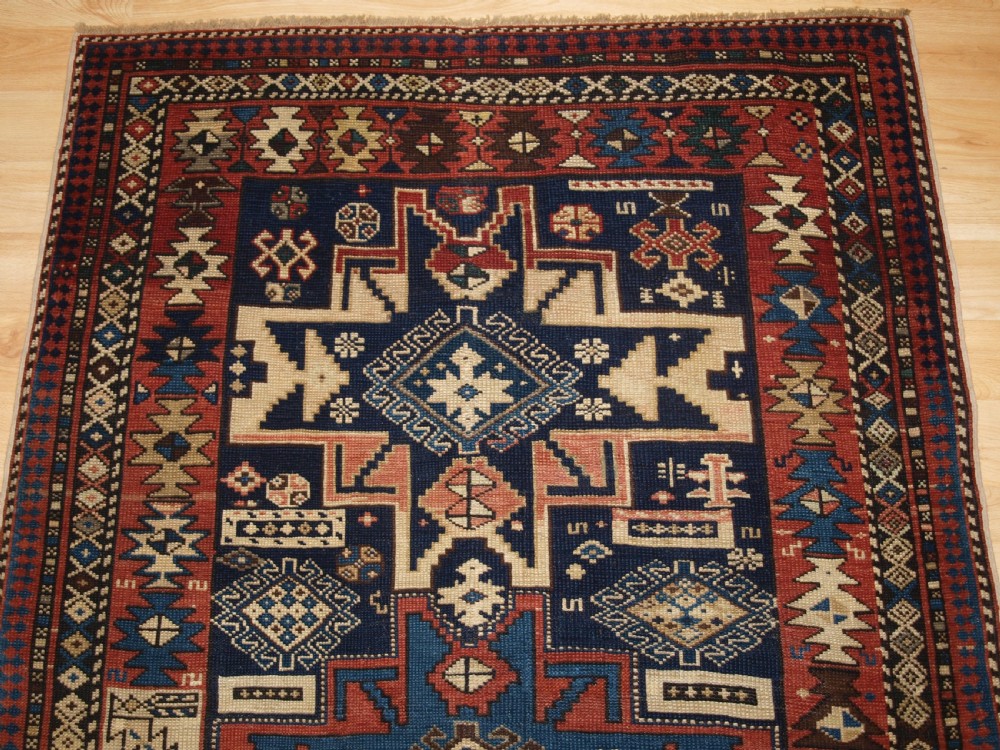 ANTIQUE CAUCASIAN SHIRVAN RUG WITH LESGHI STAR DESIGN, CIRCA 1890. View IV