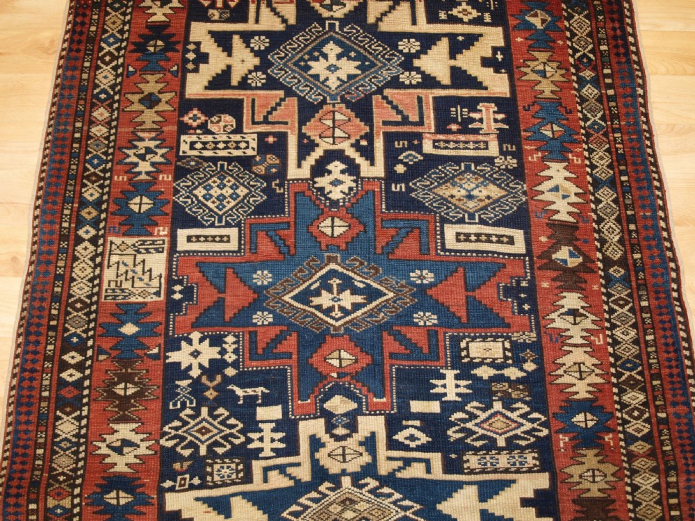 ANTIQUE CAUCASIAN SHIRVAN RUG WITH LESGHI STAR DESIGN, CIRCA 1890. View V