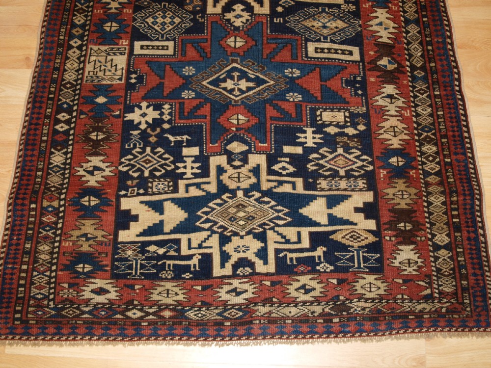 ANTIQUE CAUCASIAN SHIRVAN RUG WITH LESGHI STAR DESIGN, CIRCA 1890. View VI