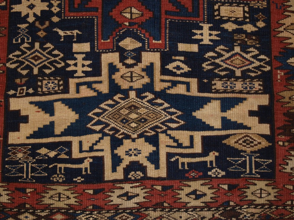 ANTIQUE CAUCASIAN SHIRVAN RUG WITH LESGHI STAR DESIGN, CIRCA 1890. View X