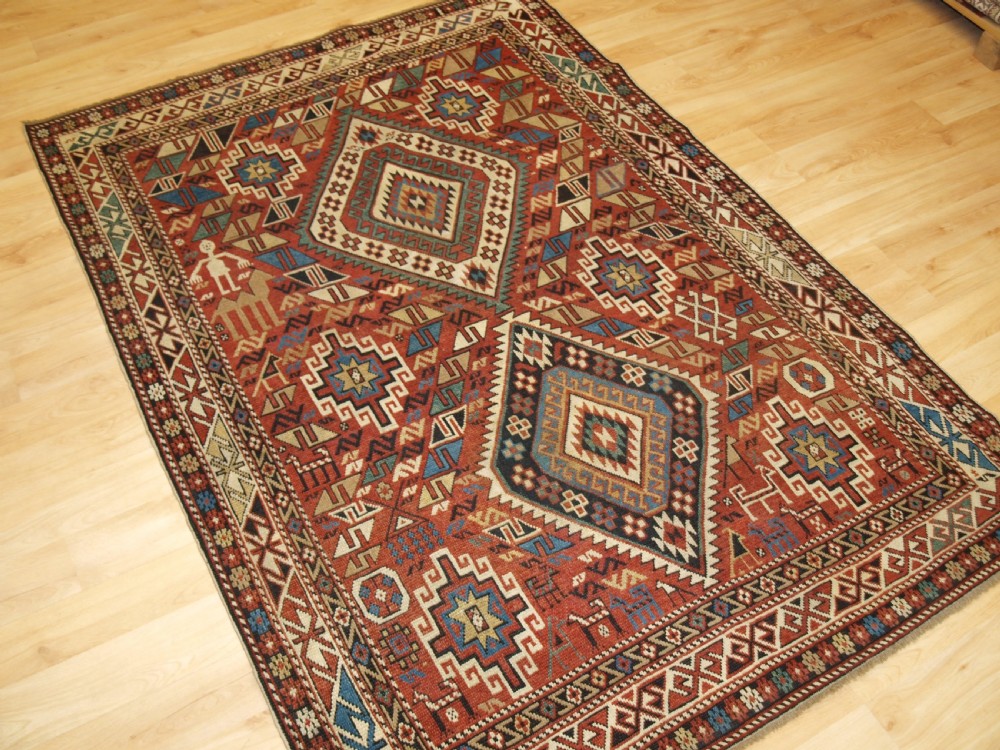 ANTIQUE CAUCASIAN DAGHESTAN RUG, CAMEL, PEOPLE AND ANIMALS, CIRCA 1890 View II