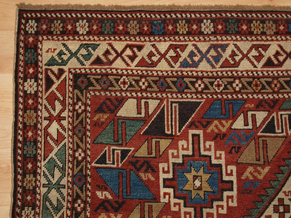 ANTIQUE CAUCASIAN DAGHESTAN RUG, CAMEL, PEOPLE AND ANIMALS, CIRCA 1890 View III