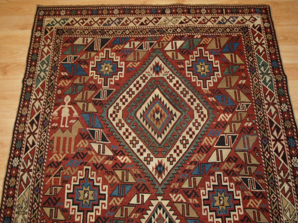 ANTIQUE CAUCASIAN DAGHESTAN RUG, CAMEL, PEOPLE AND ANIMALS, CIRCA 1890 View IV