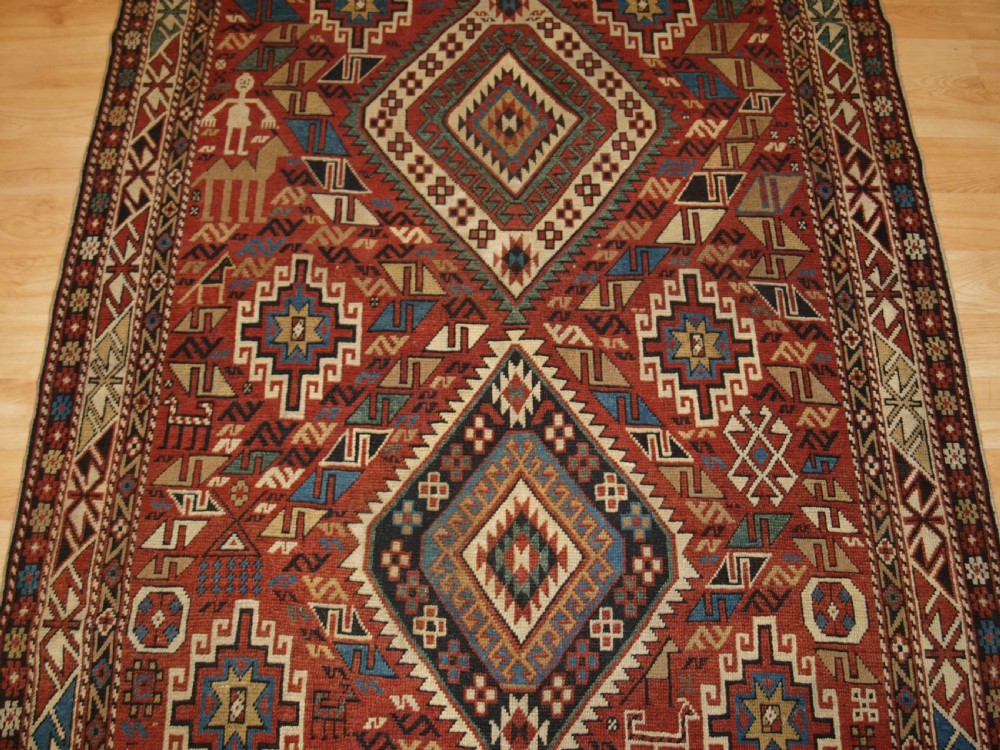 ANTIQUE CAUCASIAN DAGHESTAN RUG, CAMEL, PEOPLE AND ANIMALS, CIRCA 1890 View V