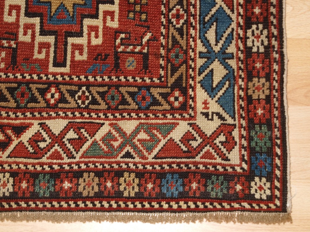 ANTIQUE CAUCASIAN DAGHESTAN RUG, CAMEL, PEOPLE AND ANIMALS, CIRCA 1890 View XIV