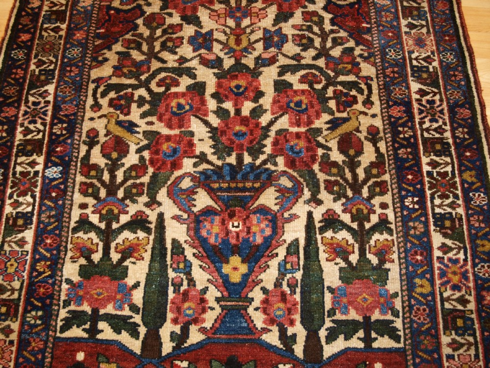 ANTIQUE BAKHTIARI RUG OF VASE AND GARDEN DESIGN, CIRCA 1900/20. View V