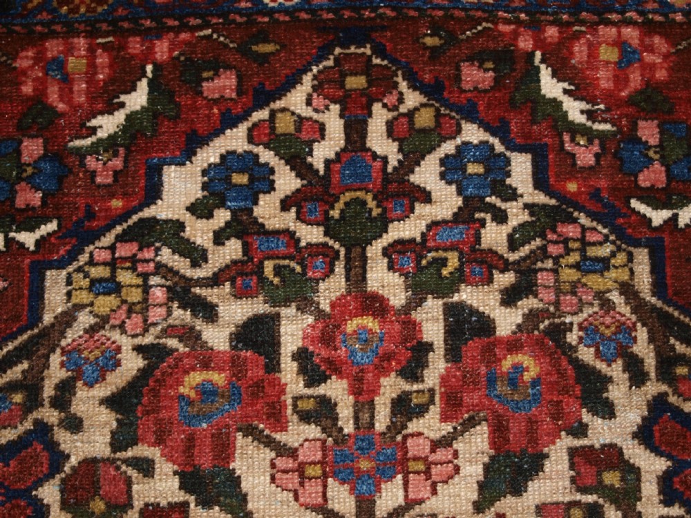 ANTIQUE BAKHTIARI RUG OF VASE AND GARDEN DESIGN, CIRCA 1900/20. View VII