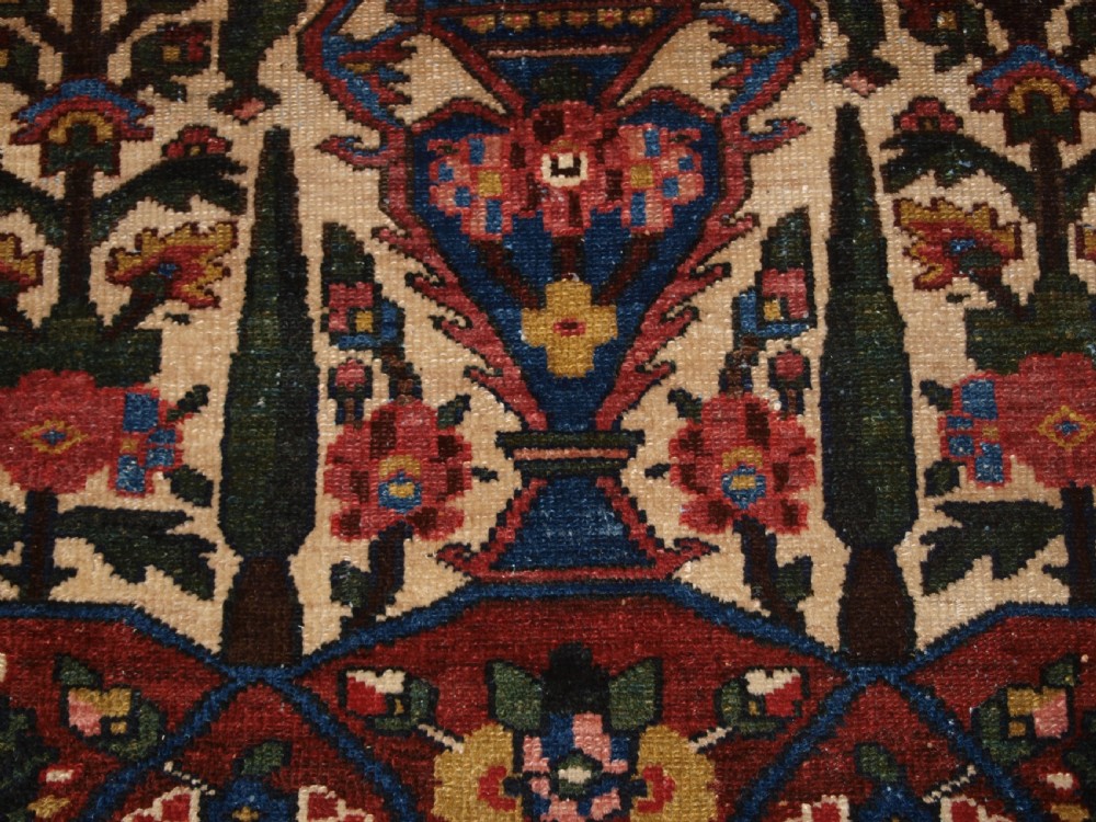 ANTIQUE BAKHTIARI RUG OF VASE AND GARDEN DESIGN, CIRCA 1900/20. View VIII