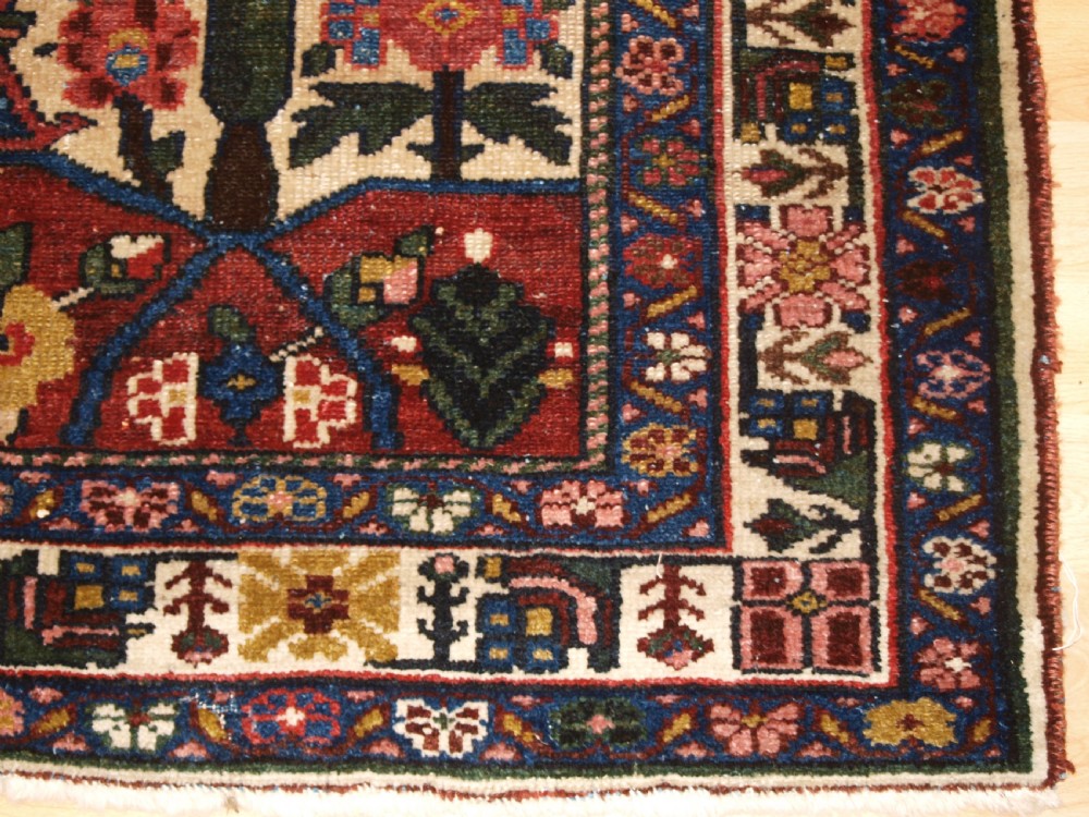 ANTIQUE BAKHTIARI RUG OF VASE AND GARDEN DESIGN, CIRCA 1900/20. View X